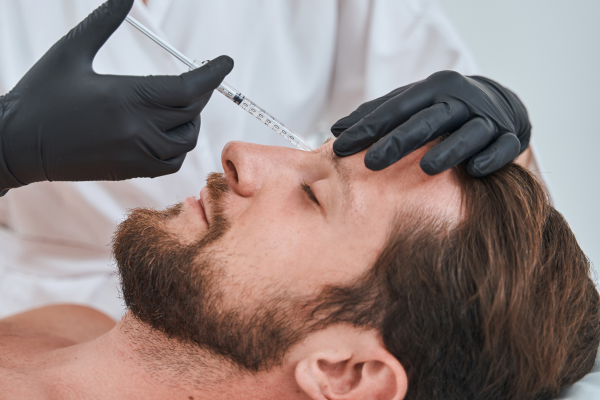 Anti Wrinkle Treatment Wolverhamton - Man receiving anti wrinkle injections in the top of his nose